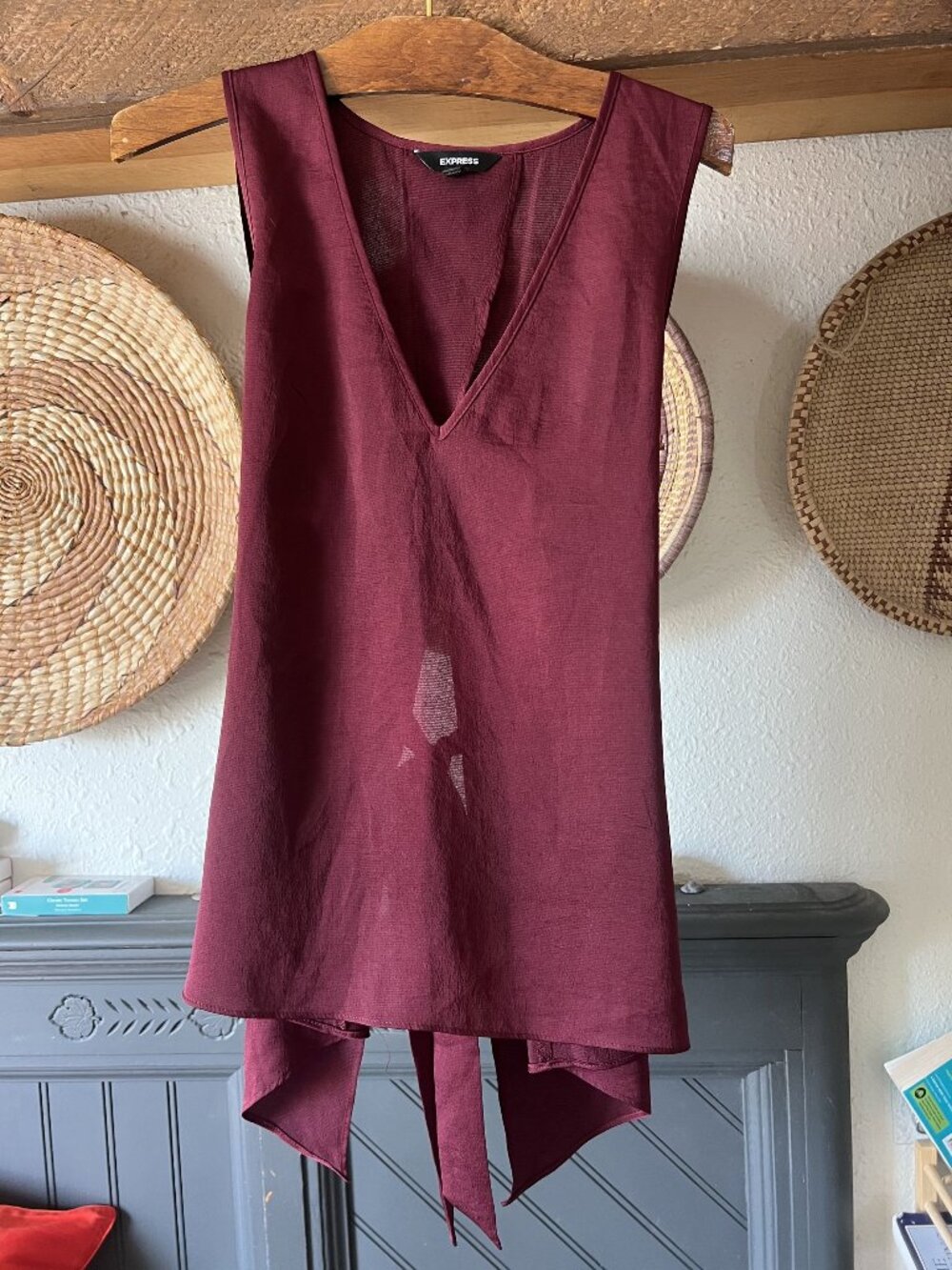 Express sleeveless top Medium deep V-neck, a tie-back detail wine/eggplant
